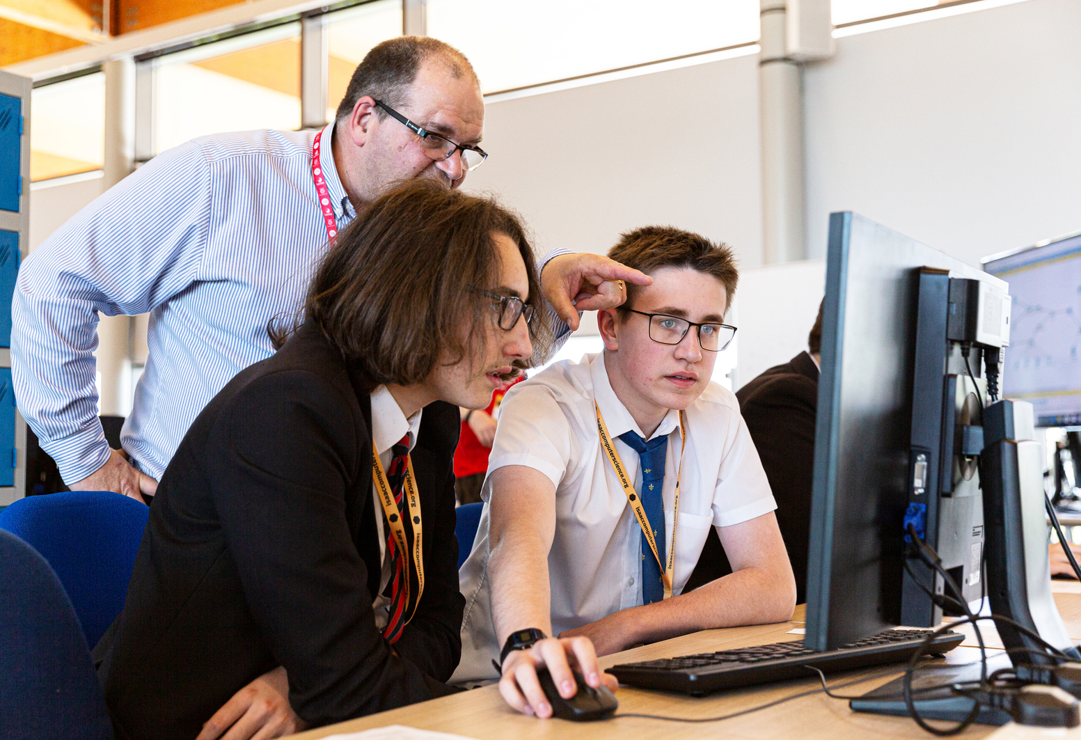 Director of Computer Science Duncan Maidens discusses networking with some A level students.